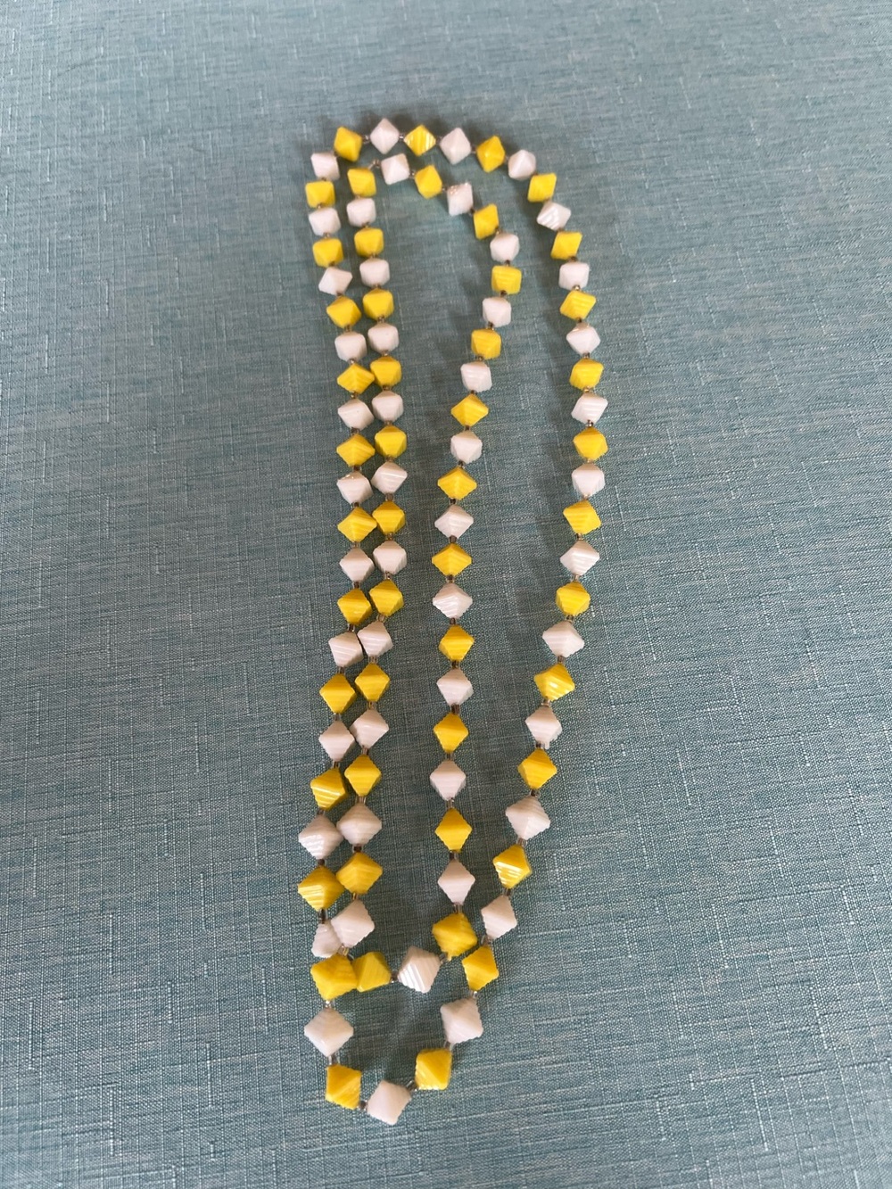 Vintage 1960s yellow and white lucite polygon bead necklace 48”